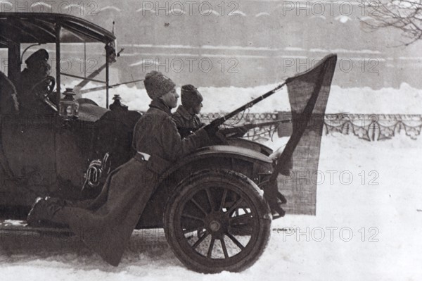Revolutionaries hung at a car with the red flag, Saint Petersburg, 1917, Russia, Europe