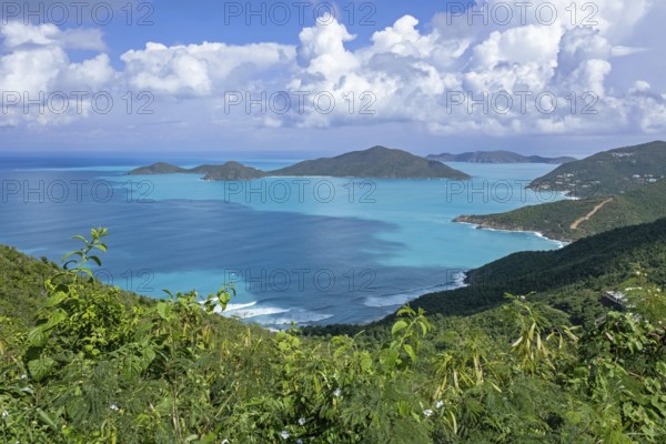 Seascape showing islets and azure-blue water on the north side of the island Tortola, British