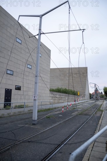The tram overhead line is torn down after the partial collapse of the Carola Bridge in Dresden,