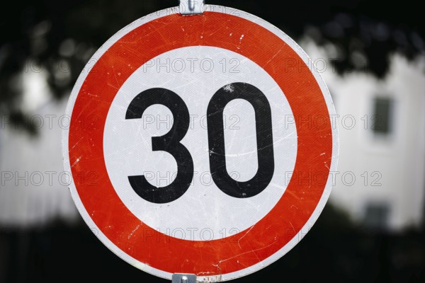 Symbol photo on the subject of speed limit 30 km/h. Close-up of a traffic sign with a 30. Berlin,