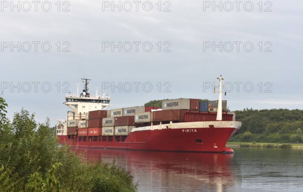 Container ship Pirita sailing in the Kiel Canal, Kiel Canal, Schleswig-Holstein, Germany, Europe