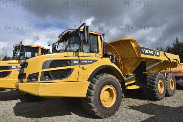 Articulated dumpers, dump trucks on a construction site, Denmark, Europe