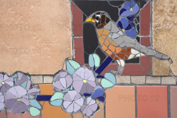 Wall mosaic with migratory thrush by Isidora Paz López 2019, one, bird figure, flower figures,