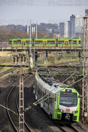 Tram line 112 on bridge, S-Bahn train on railway line between Mülheim an der Ruhr, in the