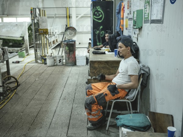 Workers during a break in the production of segments for the Brenner Base Tunnel, Zenzendorf,