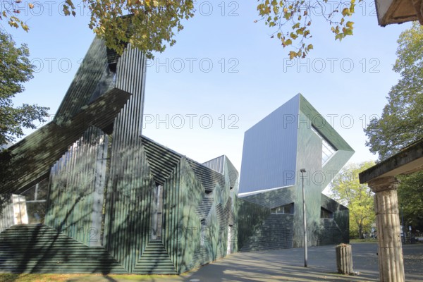 New synagogue built in 2010, Magenza, modern building and pillar of old destroyed building,