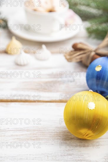Christmas or New Year frame composition. Decorations, box, balls, cinnamon, ribbons, fir and spruce