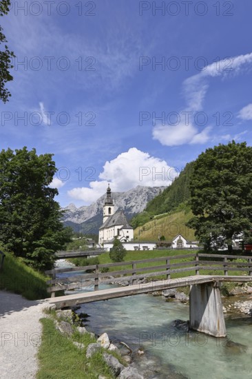 Parish church of St Sebastian with Ramsauer Ache, Reiteralpe in the background, Ramsau,