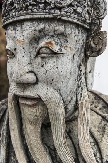 Stone sculpture in Wat Pho temple, head, face, weathered, Buddhism, religion, world religion,