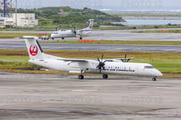 Dash 8 Q400 aircraft of Ryukyu Air Commuter with registration JA82RC at Okinawa Airport (OKA) in