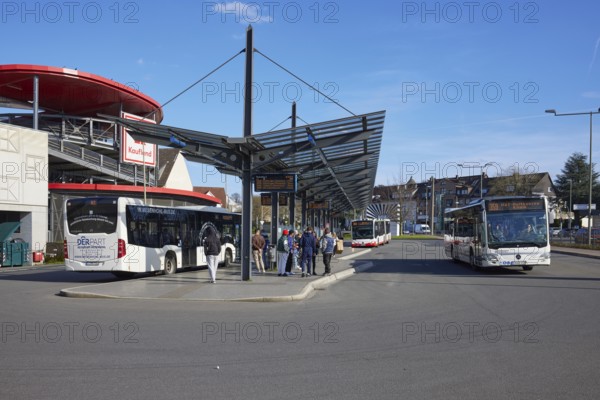 Kaufland car park and the bus station with departing bus in Hattingen, Ennepe-Ruhr-Kreis, North