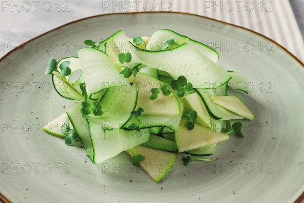 Spring, green salad, cucumber with apple, top view, close-up, no people, microselen radish, healthy