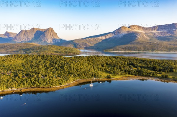 Aerial view over the fjord Efjord south of Narvik, seen at sunset, leisure boats anchor, holiday
