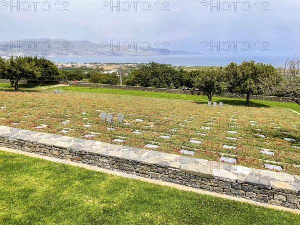 View over rows of graves with gravestones Grave slabs on part of German military cemetery
