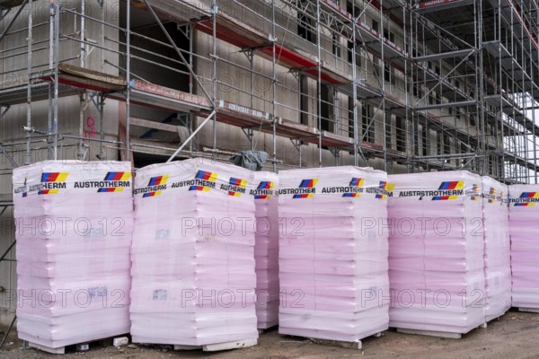 New construction, shell construction, thermal insulation, material waiting to be installed on the