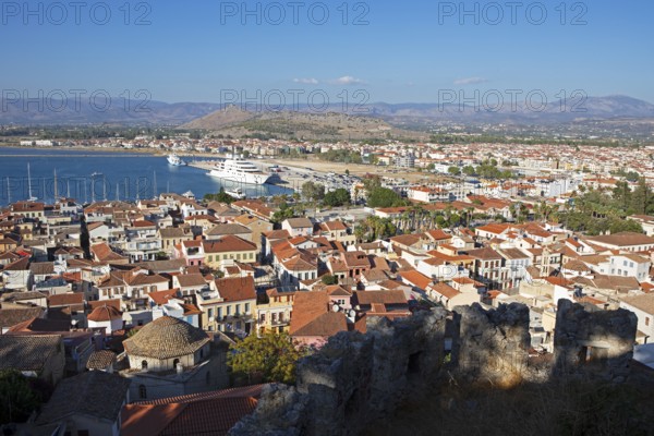 View of the rooftops and harbour of Nafplio and the Argolic Gulf, Argolis, Peloponnese, Greece,