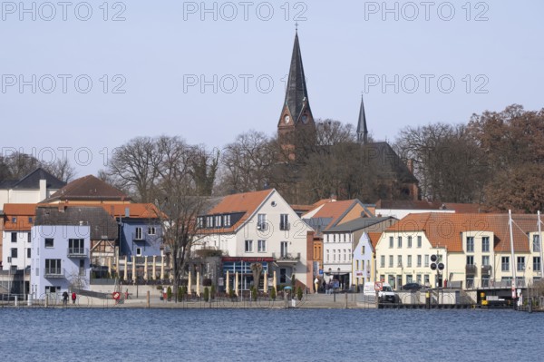 Town view at Lake Malchow with town harbour and town church, Malchow, island town, Mecklenburg Lake