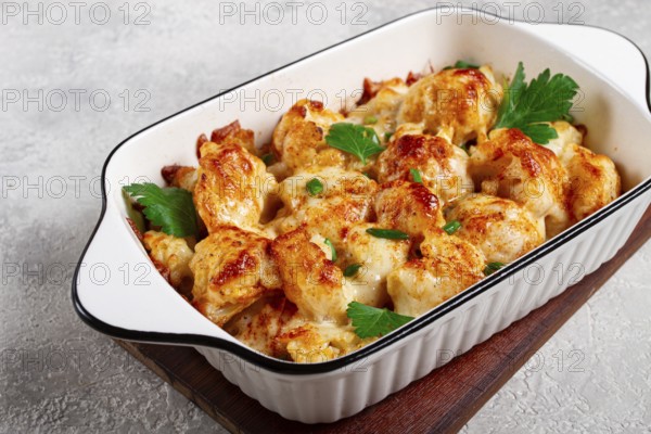 Baked cauliflower, in cream sauce, with cheese and spices, homemade, no people