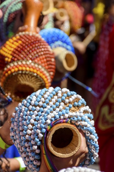 A rattle of African origin called xereque brought to Brazil by slaves and used in samba, carnival,