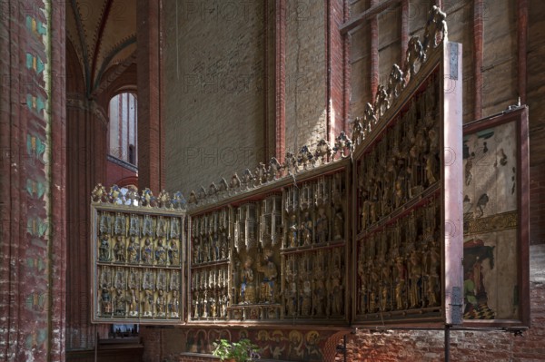 Altar retable from 1430 from St Georgen set up in St Nikolai's Church, late Gothic brick building,