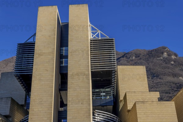 Modern Design Building Against Blue Clear Sky and Mountain in Campione d'Italia, Lombardy, Italy,