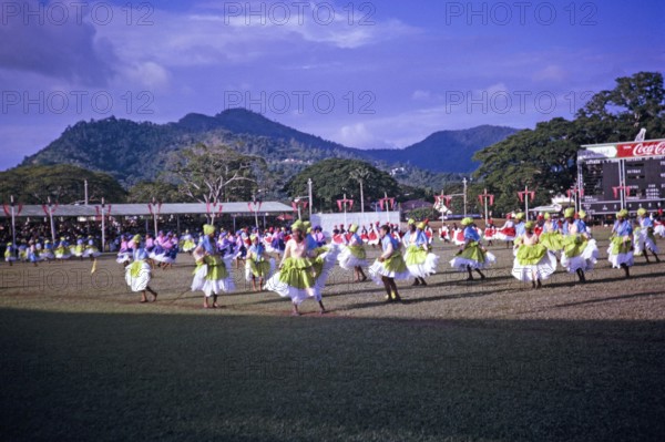 Colourful young female dancers, Port of Spain, Trinidad c 1962 independence pageant