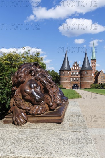 Holstentor Holsten Tor with Lübeck Lion in the Hanseatic city of Lübeck, Germany, Europe