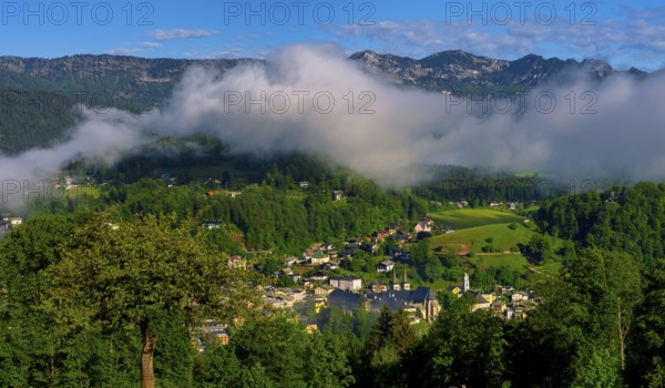 Morning fog over the village of Berchtesgaden in the valley, Berchtesgaden National Park, Upper