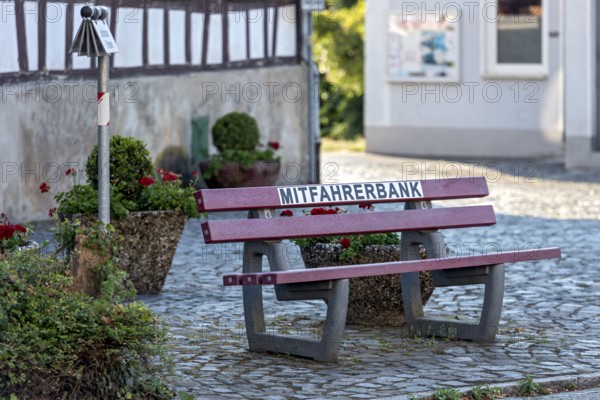 Carpool bench, carpool bench with direction sign for direction of travel, public bench for private