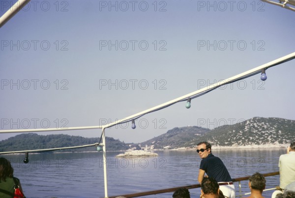 Boat approaching thought to be Korcula, Dalmatian Coast, Croatia, former Yugoslavia, Europe 1970,