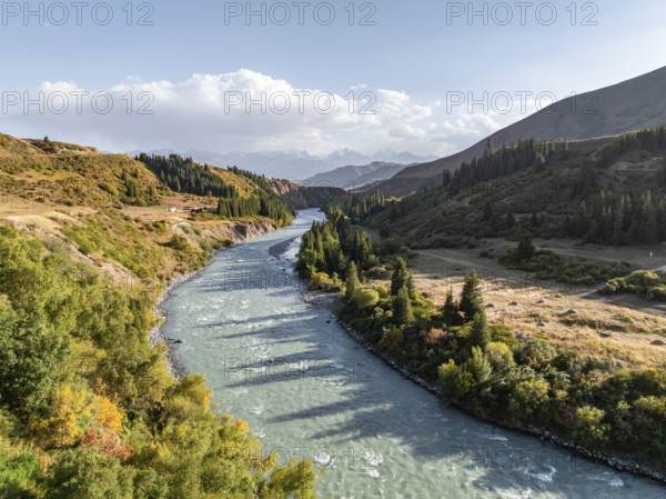Mountain landscape with river in a narrow mountain valley in autumn, Little Naryn or Kichi-Naryn,