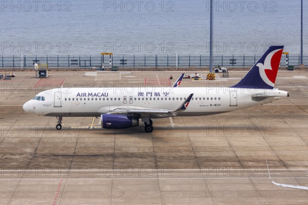 An Air Macau Airbus A320 aircraft with the registration B-MCH at the airport in Macau, China, Asia