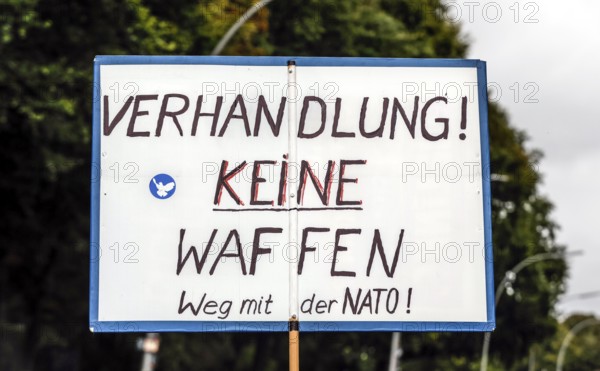 Poster at the demonstration of the alliance Never again war on the Day of Unity in Berlin, 03.10