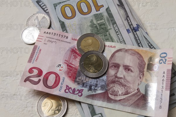 Lari, 20 GEL, Georgian monetary currency, with dollars, banknotes, top view, no people, on the