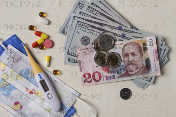 Georgian monetary currency, Lari, 20 GEL, medicine, thermometer, protective medical masks, concept,