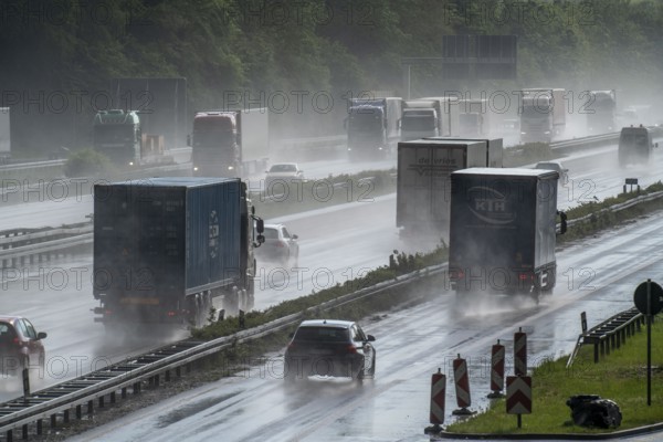 A2 motorway, at Recklinghausen motorway junction, heavy traffic during a thunderstorm, North
