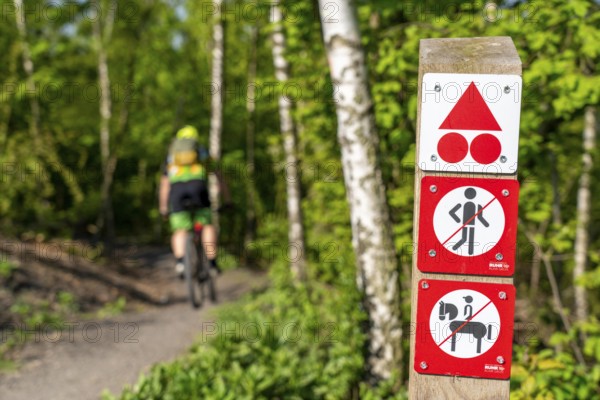 Signpost on the Brammentrail, mountain bike trail on the Schurenbach spoil tip, in Essen North
