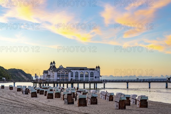 The pier of Sellin, evening mood, sunset, 394 metres long, with restaurant, jetty, beach chairs,
