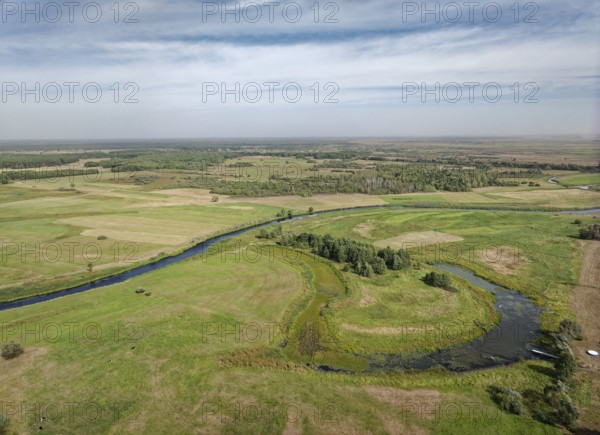 The meandering Biebrza River in the Biebrza National Park in northern Poland. Goniadz, Podlasie,