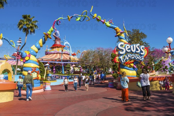 Park guests near entrance to Seuss Landing in Islands of Adventure at Universal Studios, Orlando,