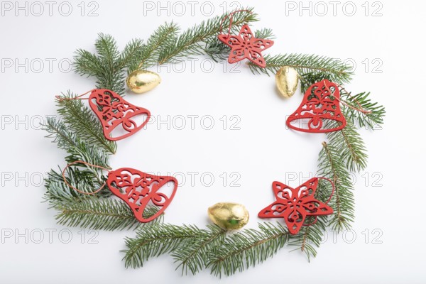 Christmas or New Year wreath composition. Decorations, stars, bells, fir and spruce branches, on