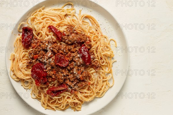 Spaghetti bolognese, with dried tomatoes, homemade, close-up