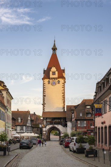 View across the main street to the Kinzigtor, historic town tower and landmark in the old town