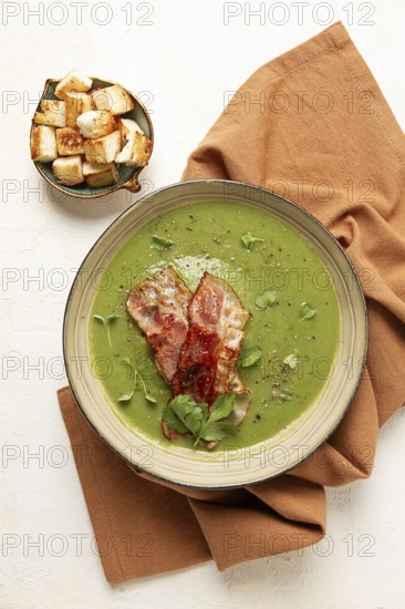 Green mashed soup, with bacon and croutons, homemade, no people