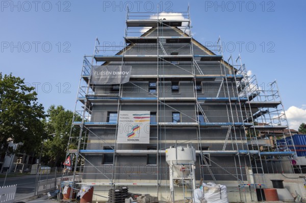 Scaffolding on a new residential building with thermal insulation, Erlangen, Middle Franconia,