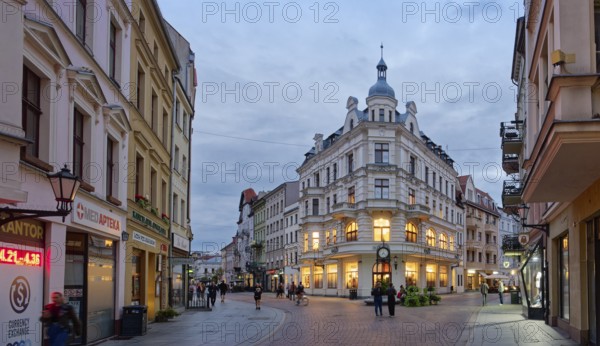 Szeroka Street in the medieval old town of Thorn, illuminated in the evening. The historic city