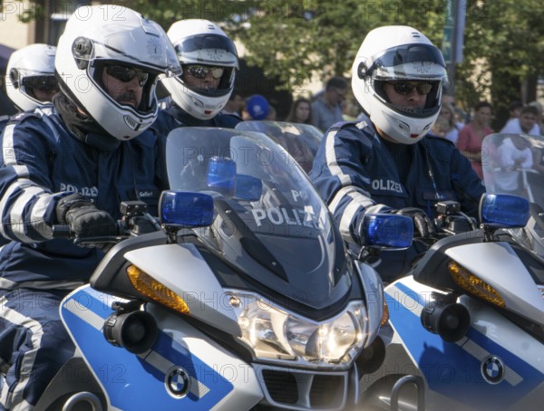 Berlin police officers from the motorbike squadron during a column ride at the Berlin police open