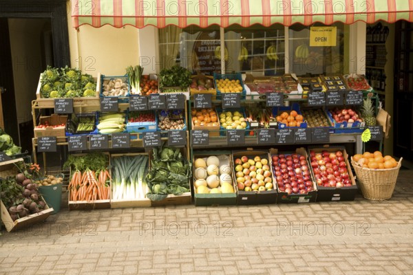 Display of fresh vegetables outside greengrocers shop, Halesworth, Suffolk, England, United