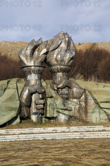 Burning torch sculpture Buzludzha monument former communist party headquarters, Bulgaria, eastern