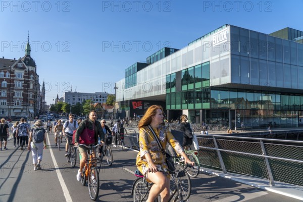 Cyclists on the Lille Langebro cycle and pedestrian bridge over the harbour, Copenhagen is